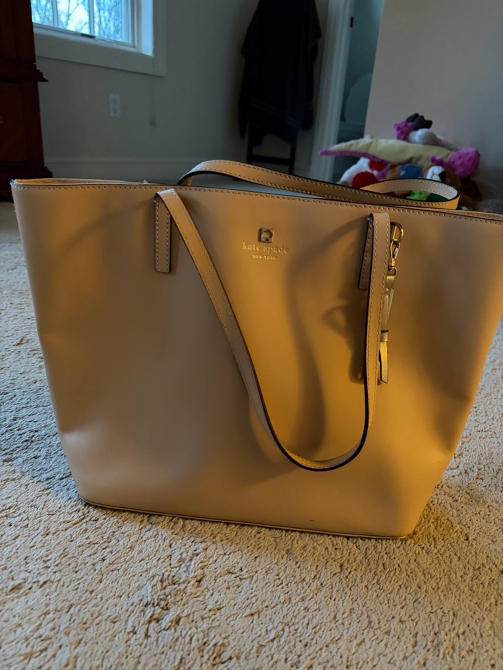 kate spade neutral beige leather tote with gold logo